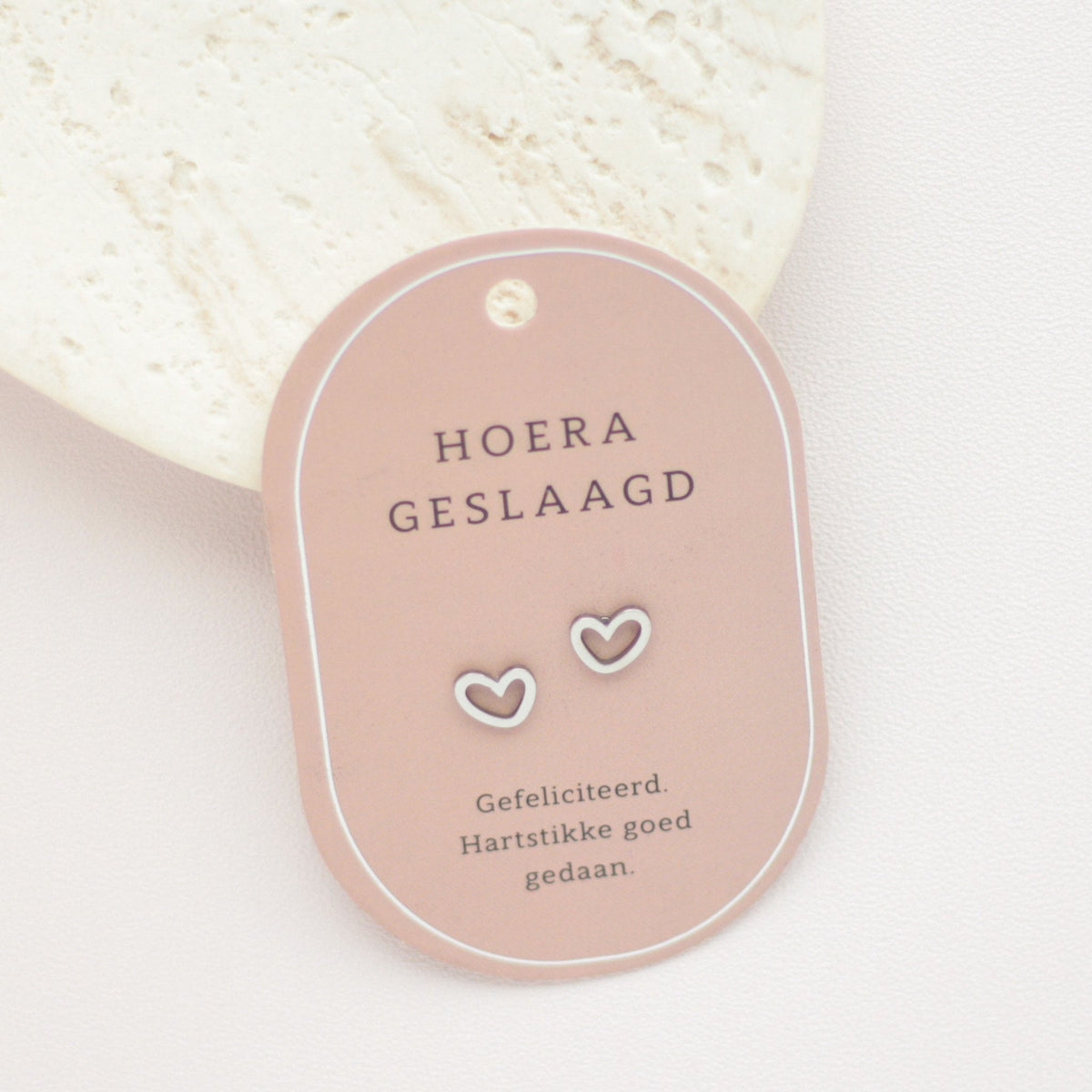 Geslaagd oorbellen zilverkleurig